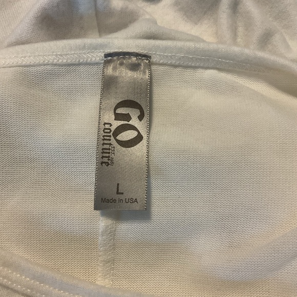 An asymmetrical hem lends a chic vibe to this soft and cozy pullover. - Picture 4 of 6